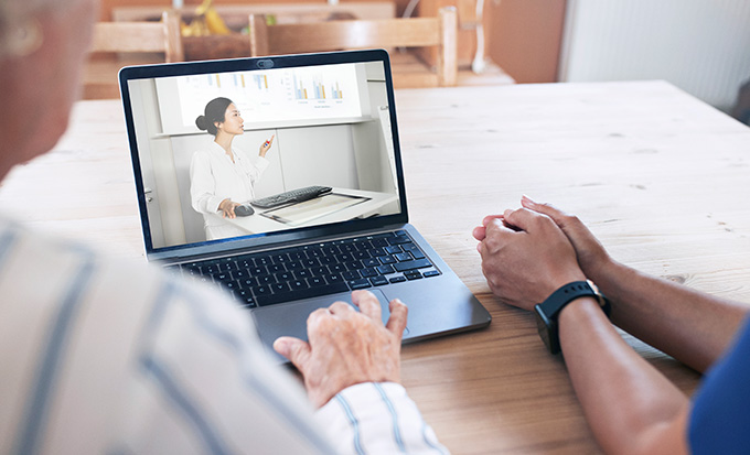 Video call with medical professional by two patients