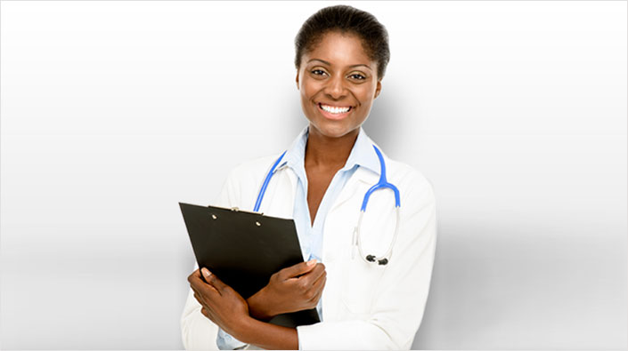 Smiling female doctor holding clipboard